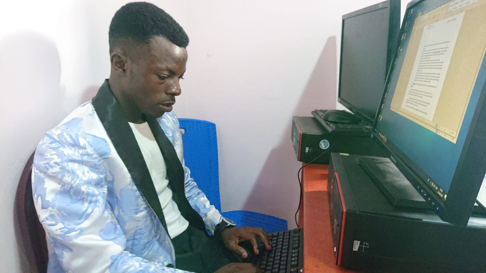 Students practicing office administration, records handling and professional coordination in a management training environment